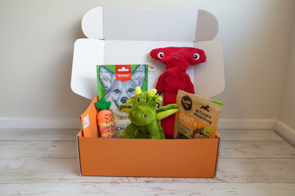 Box containing pet toys